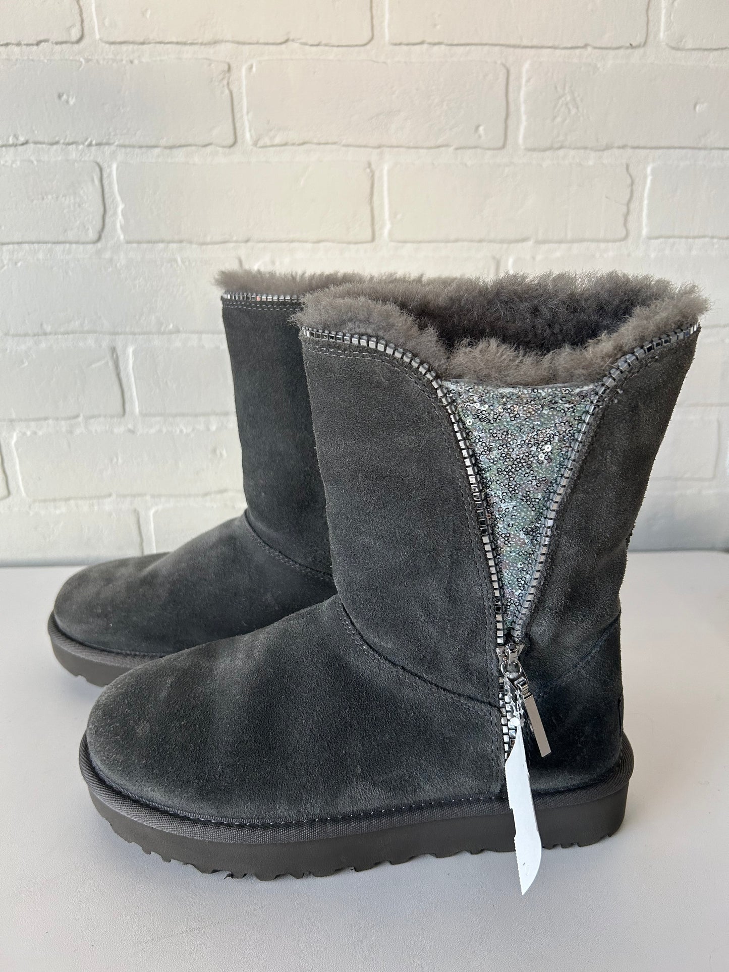 Boots Designer By Ugg In Grey, Size: 5