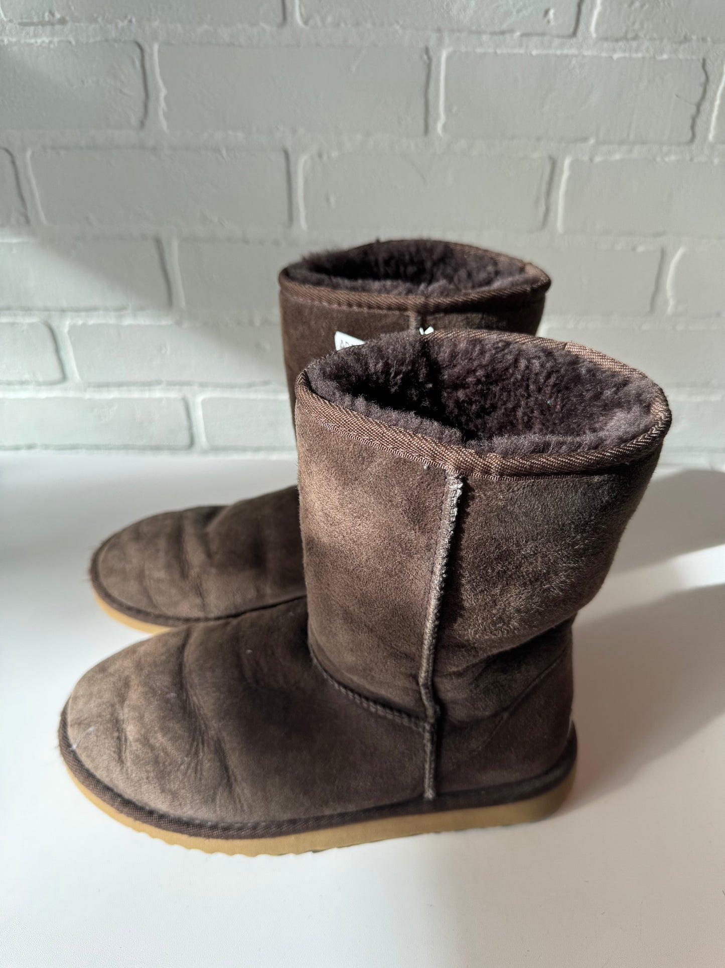 Boots Designer By Ugg In Brown, Size: 6